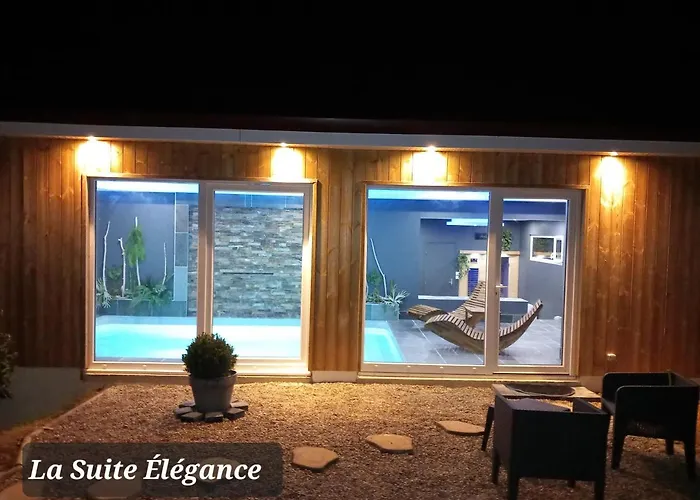 Chambre avec spa, piscine et sauna privatif